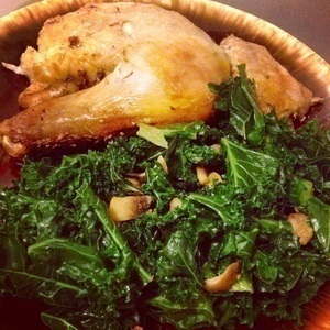Baked chicken thighs with sautéed kale and mushrooms