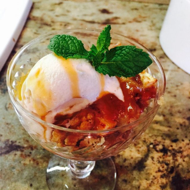 Brown Butter Apple Crisp With Vanilla Ice Cream And A Caramel Drizzle