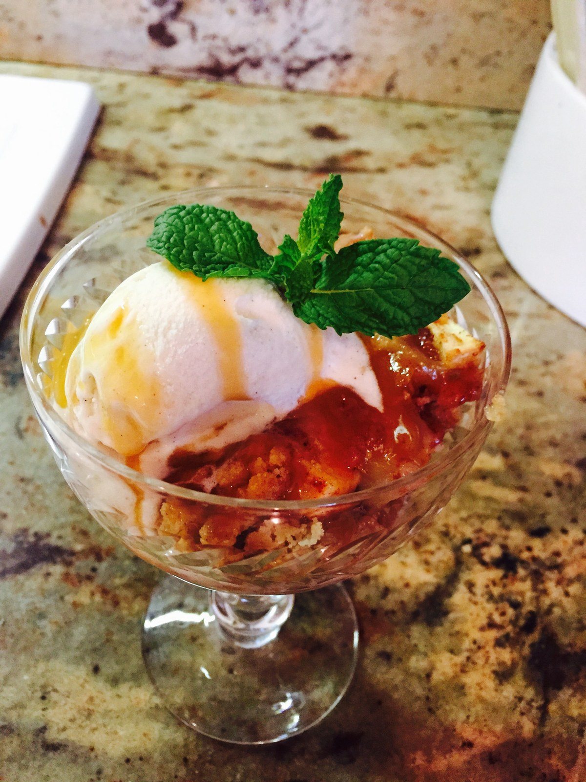 Brown Butter Apple Crisp With Vanilla Ice Cream And A Caramel Drizzle