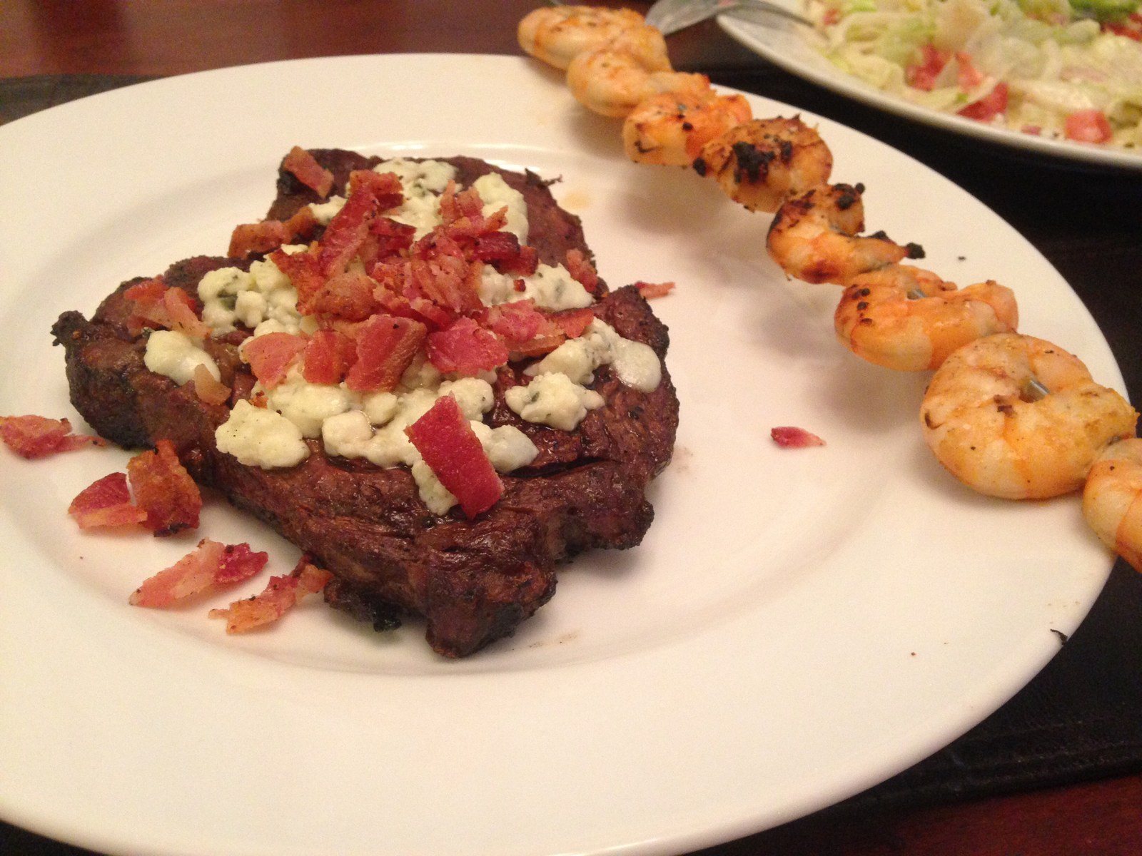 Medium Rare Ribeye With Blue Cheese And Bacon