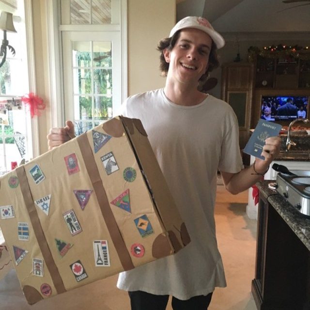 Suitcase Made From Scratch Holding Teas From Around The World Packaged With Corr