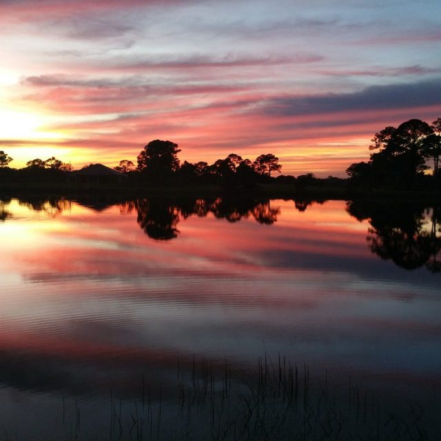 My Back Yard Sunset! Reflections On The Water.