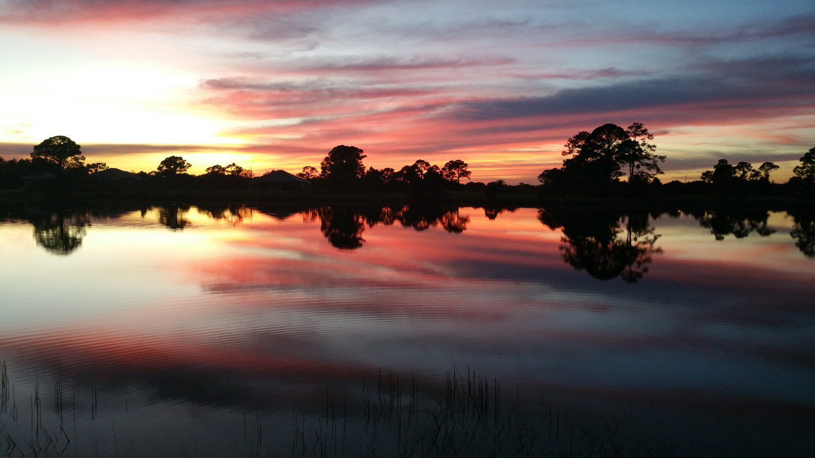 My Back Yard Sunset! Reflections On The Water.