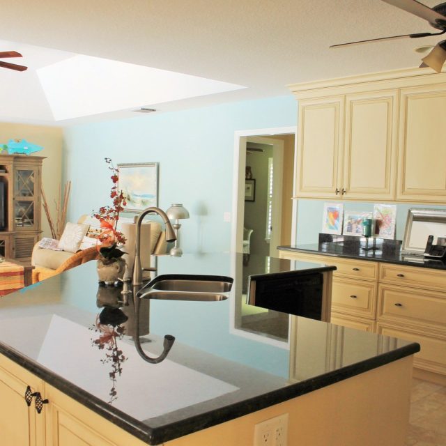 Covering Back Splash With Artwork To Cover It Up.
