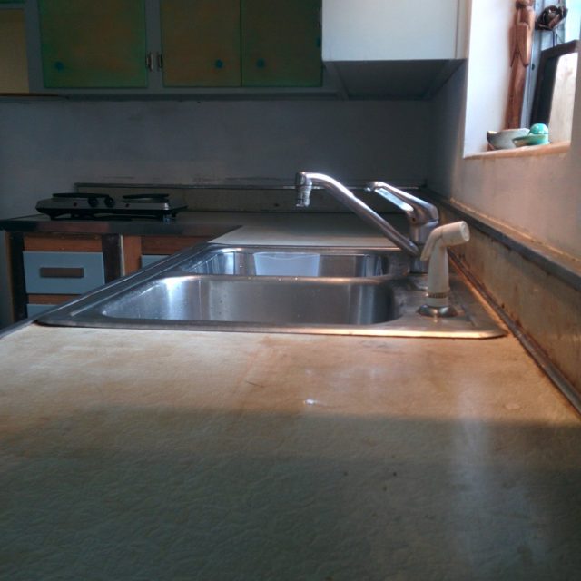 This 1950's Countertop Has Seen Better Days...