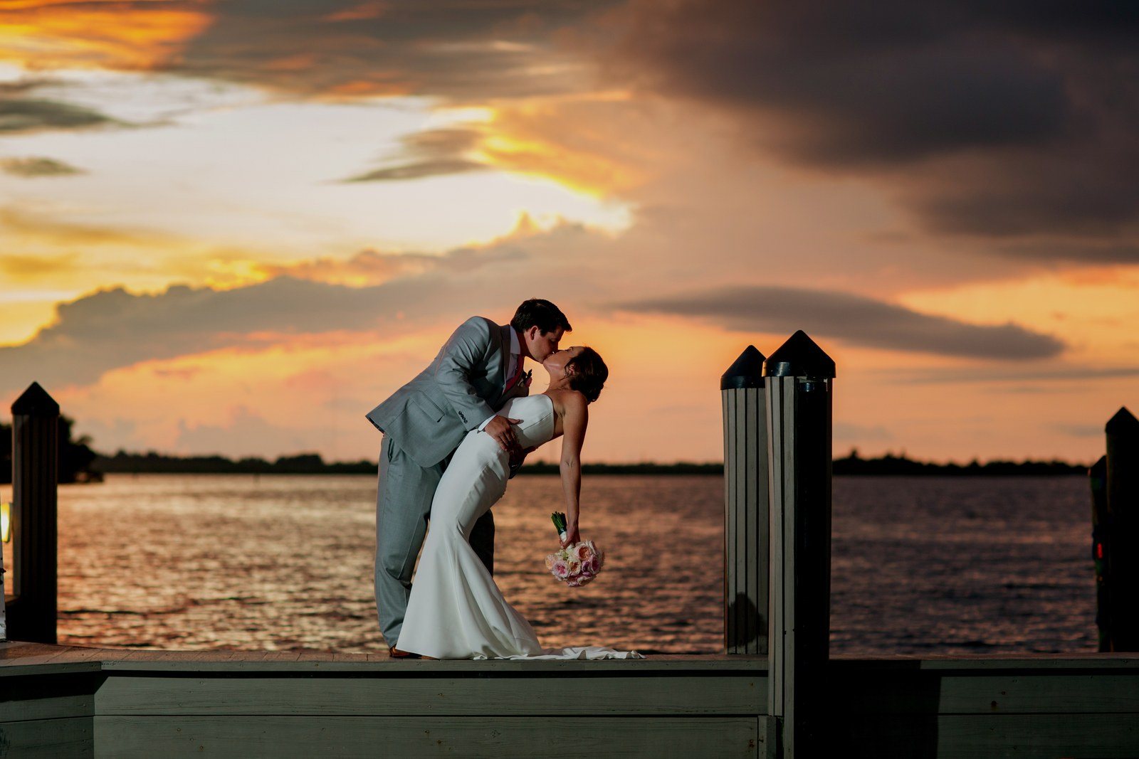Sunset Kiss For The Mr. And Mrs.