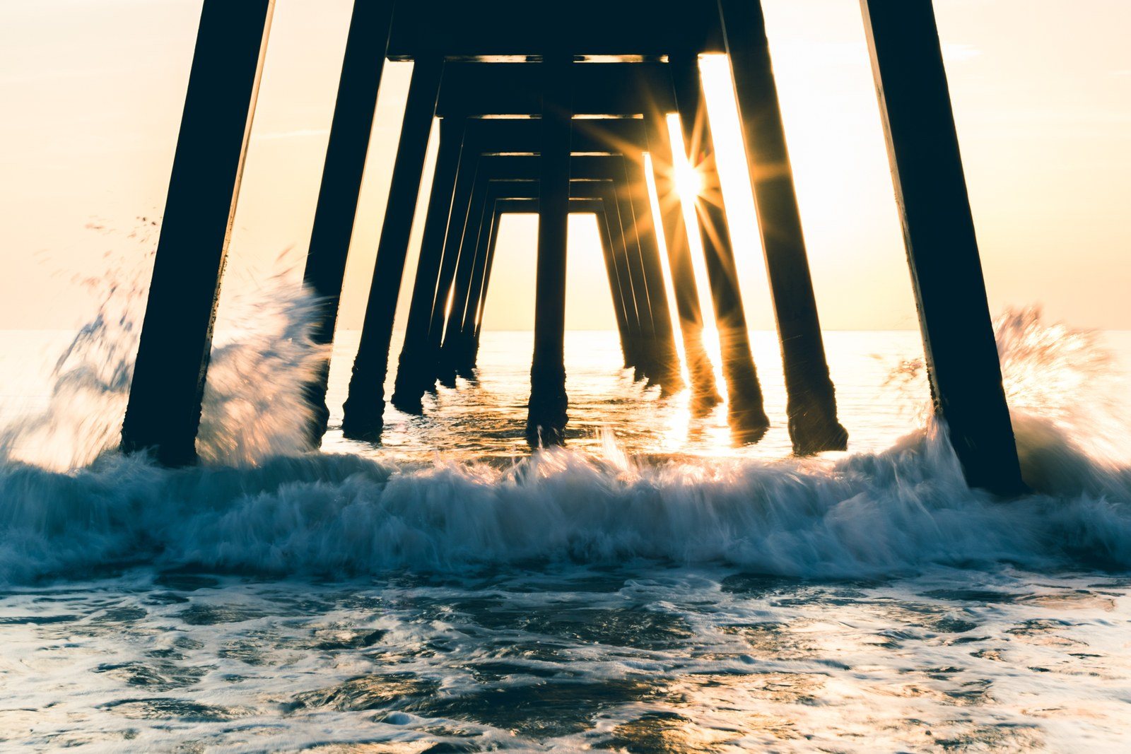Sunrise Through The Pier