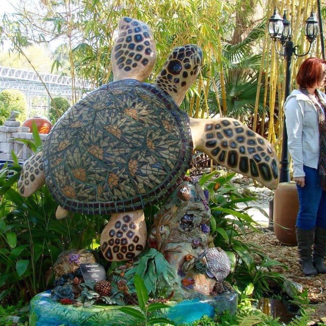 This Woman Is Named Nancy. She Works At The Gardens Where This Turtle Lives. I T