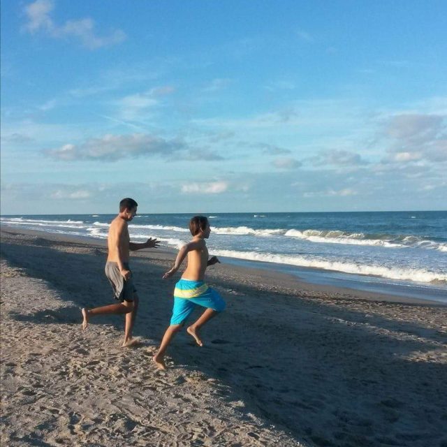 Jumping For Joy We Are At The Beach