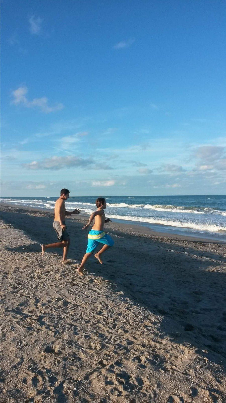 Jumping For Joy We Are At The Beach