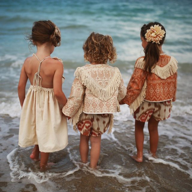Three Girls Enjoying The Water In Their Magnolia Lake Clothing