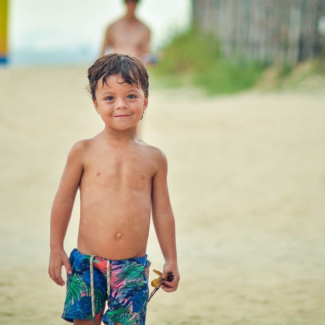 Kid On The Beach