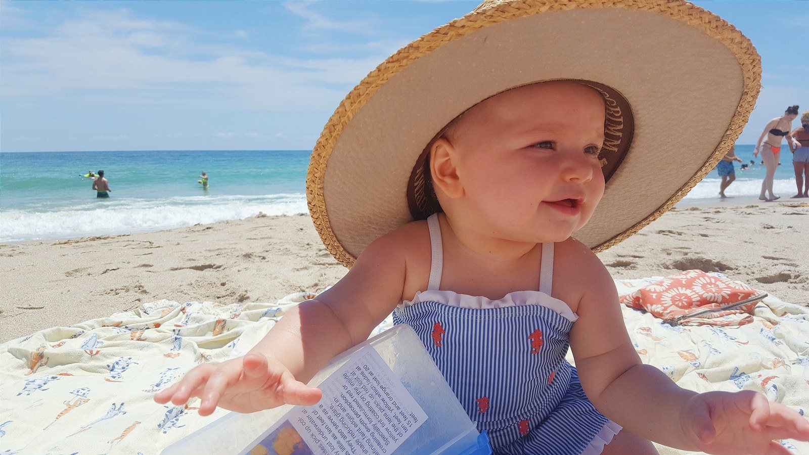 The Happiest Little Beach Babe