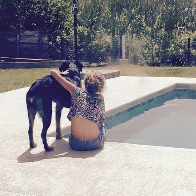 A Girls And Her Dog