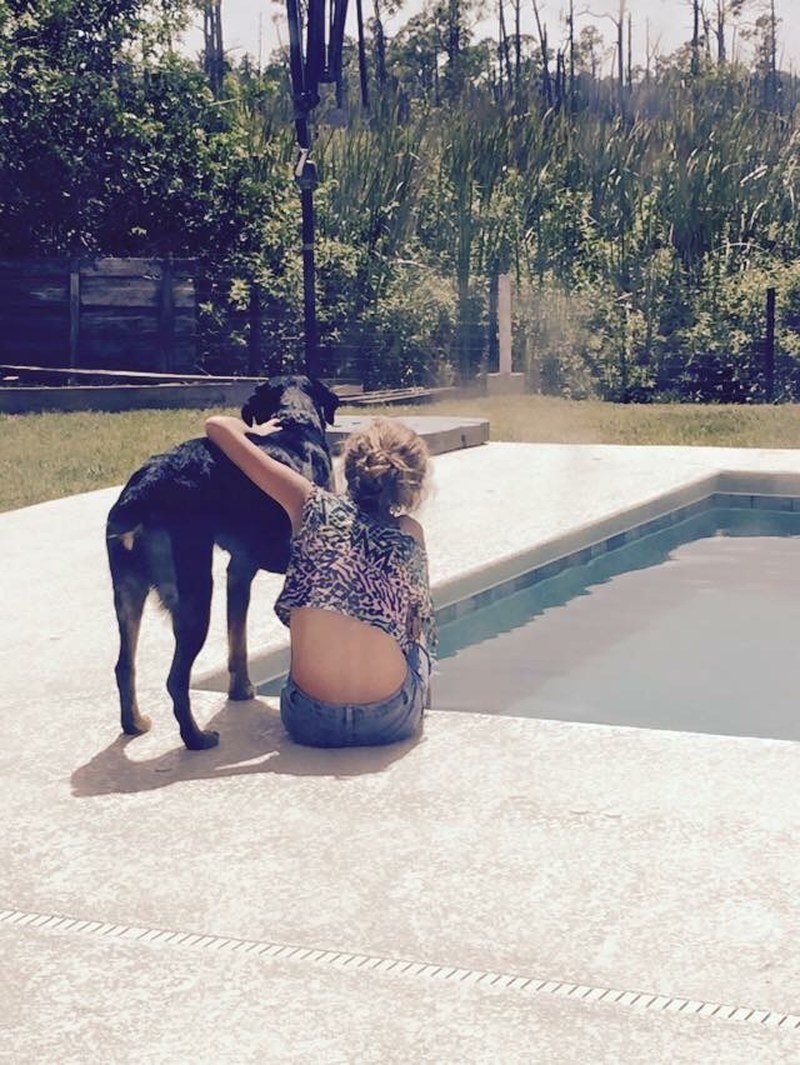 A Girls And Her Dog