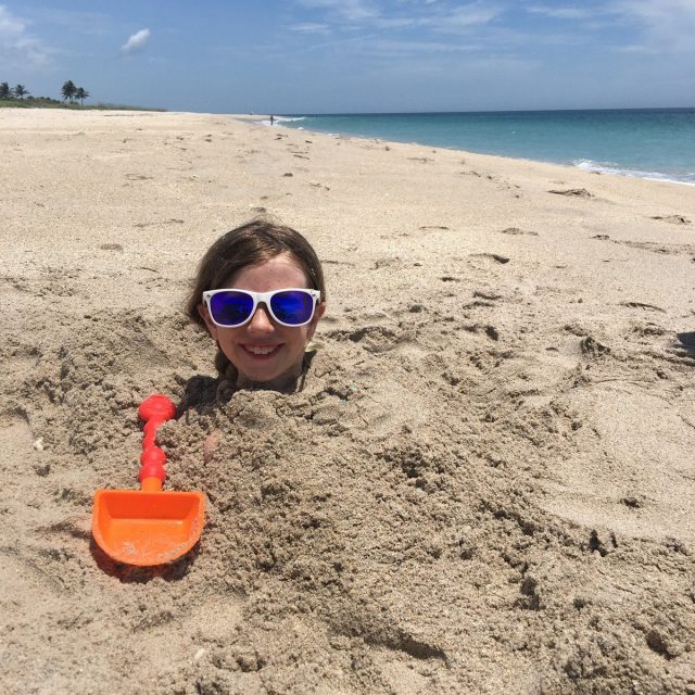 Madi Kai Buried At The Beach