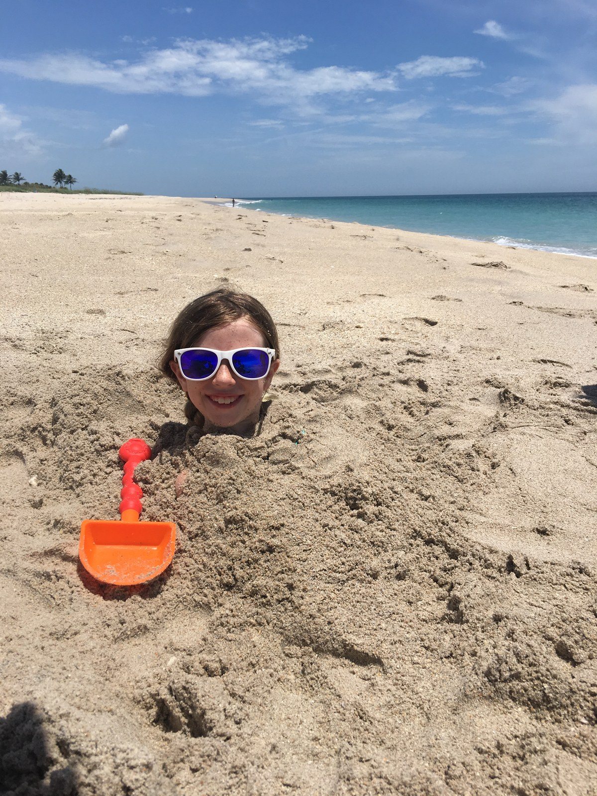 Madi Kai Buried At The Beach