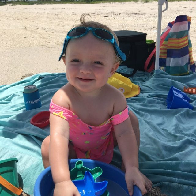 Beach Baby With Her Bucket