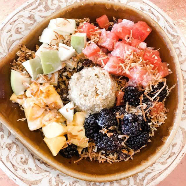 Coconut Quinoa Power Bowl With Granola, Apples, Blackberries, Watermelon, And Ma