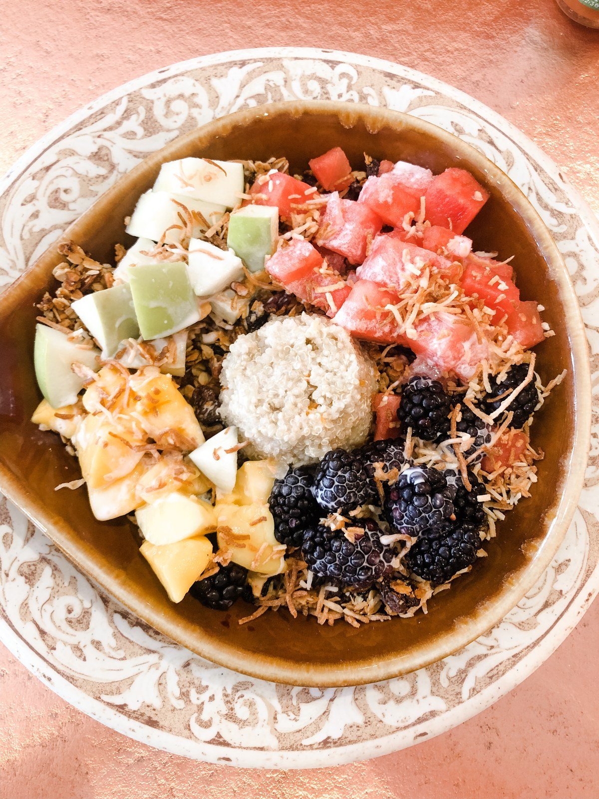 Coconut Quinoa Power Bowl With Granola, Apples, Blackberries, Watermelon, And Ma