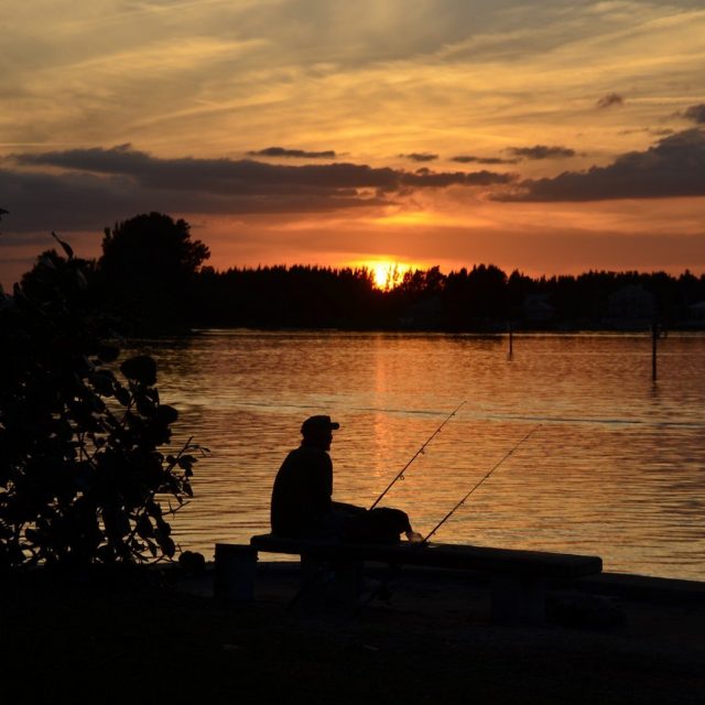 Old Fisherman And Sunset