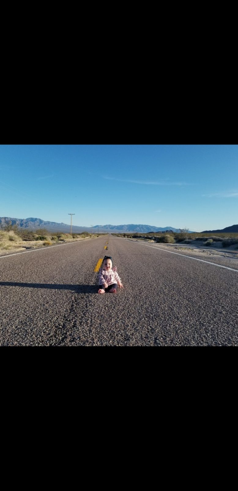 Showing The World To My Newborn Daughter