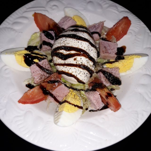 Homemade Chef Salad Topped With Burrata Cheese And Drizzled With A Balsamic Glaz